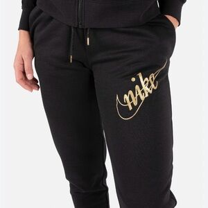 Nike Women's Black and Gold Glitter Joggers 2X